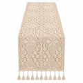 Chemin de table en macramé beige avec franges et motifs géométriques